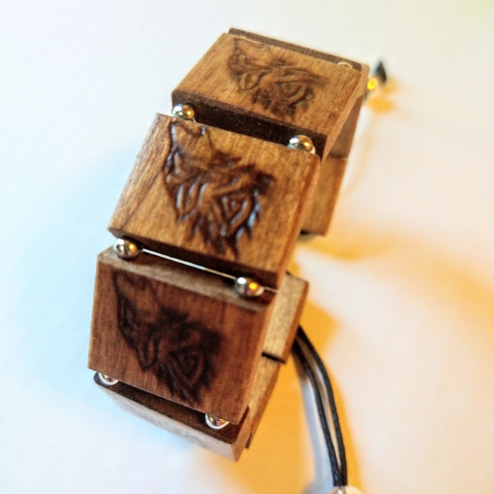 Howling wolf engraved tile slip cord bracelet